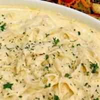 (T) Family Meal Fettuccine Alfredo For Six · Our classic Alfredo sauce, served over fresh fettuccine aand topped with Pecorino Romano.