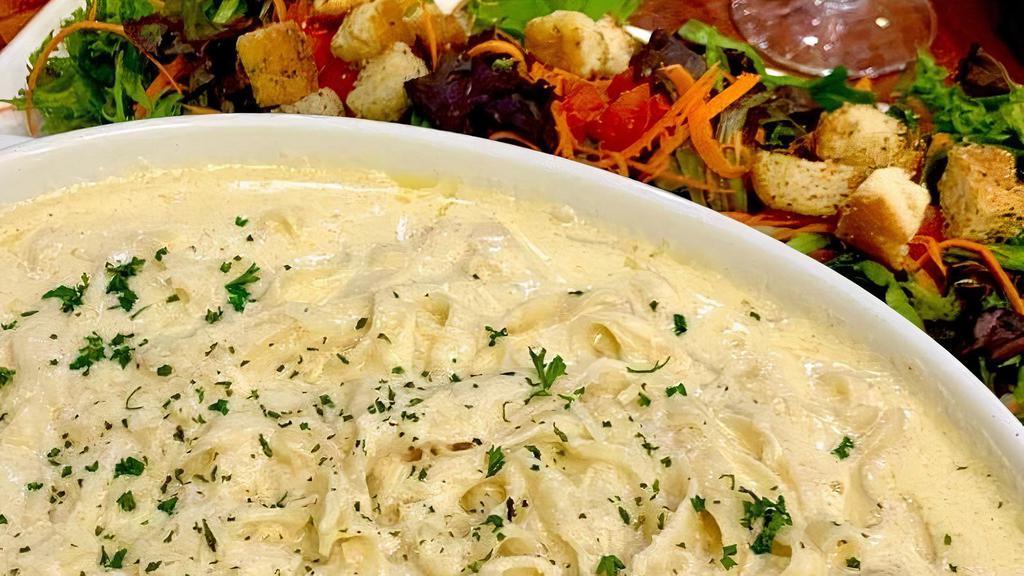 (T) Family Meal Fettuccine Alfredo For Four · Our classic Alfredo sauce, served over fresh fettuccine aand topped with Pecorino Romano.