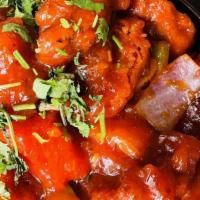 Mushroom Jalfrezi · Mushroom cooked in sweet and spicy sauce tossed with garlic, bell peppers and onion.
