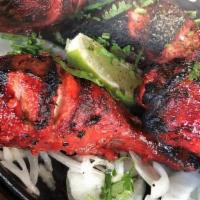 Tandoori Chicken · 5 pieces of chicken cooked in clay oven.