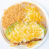 #20  Chimichanga Plate · Deep fried burrito filled with beans and cheese and your choice of shredded beef that is mix...
