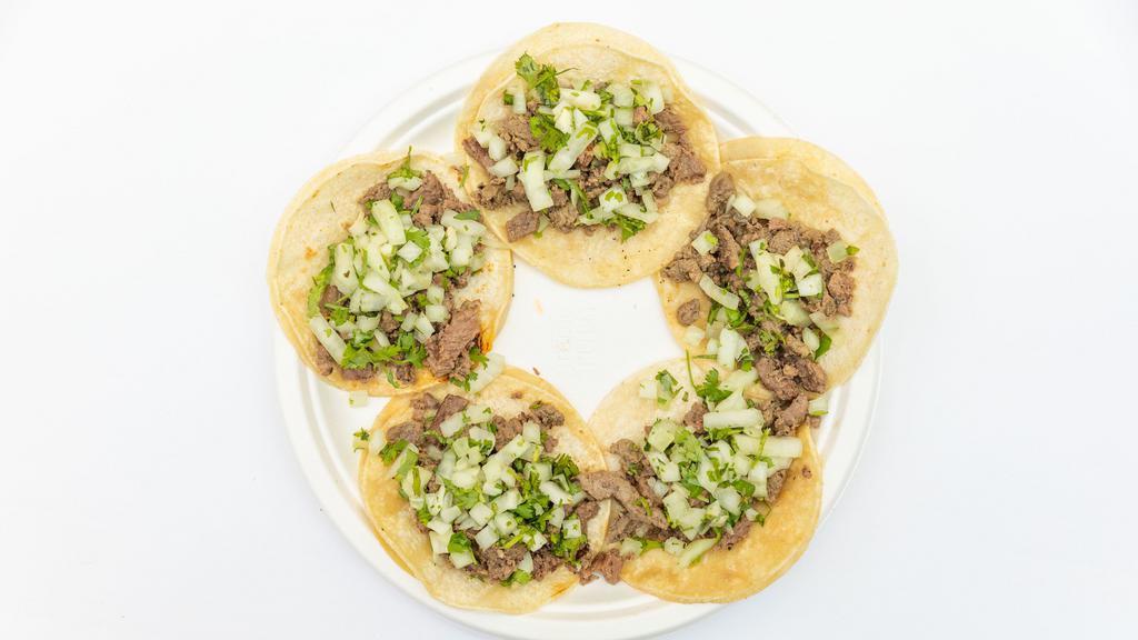 5 Mini Tacos · 5 street tacos, with your choice of meat, topped with onion and cilantro. 

choice of meat applies to all 5 tacos, thank you.