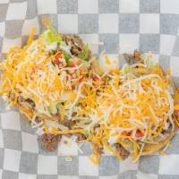 2 Sopes · 2 Sopes with your choice of meat, with beans, lettuce, sour cream, pico de gallo, and cheese...