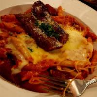 Baked Ziti · Sausage, peppers and sage topped with melted cheese.