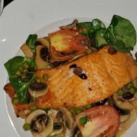 Pan Roasted Salmon · Spinach, mushrooms, olives, focaccia and garlic tomato's .