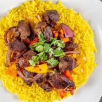 Shaya With Peppers & Onions · Lamb dry tips seared to perfection with bell peppers and onions served over rice.