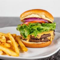 Cheeseburger · Burger with American cheese, lettuce, tomatoes, onions and pickles.