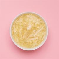 Egg Drop Soup (Large) · Wispy beaten eggs in a flavorful chicken broth with peas and carrots.