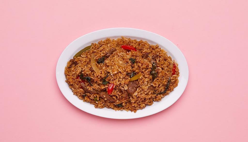 Pork Spicy Basil Fried Rice · Wok fried rice tossed with pork, basil, chili, and peppers.
