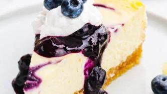 Blueberry Cheesecake · Our signature Cheesecake, topped with a nice Blueberry sauce, then topped off with fresh Blu...