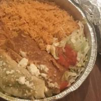 Enchiladas · Choice of meat, sauce, cheese, served with rice and beans (comes with two).