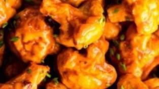 Mild Buffalo Cauliflower Bites · Served with celery or carrots, and blue cheese or ranch.