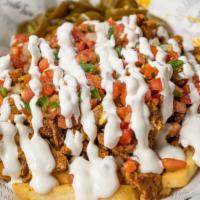 Al Pastor Fries · Cheese smothered fries with marinated pork, pico de gallo, sour cream and jalapeños.