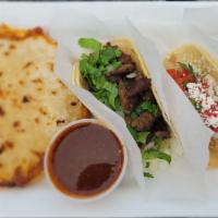 Taco Combo · Comes with three tacos, Asada, Chicken , Al Pastor and Chicken Mulita.