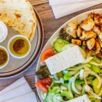 Central Grecian Greek Platter* (Made For Sharing) · Souvlaki, chicken, and gyros. Served with pita and tzatziki.