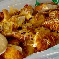 Vali'S Fries · Our delicious home-style fries topped with tiras de pollo and cheese and served with a side ...