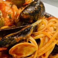 Linguini Al Frutti Di Mare · Fresh Mussels, Large Prawns, Calamari, Mussels and clams, Spicy Marinara