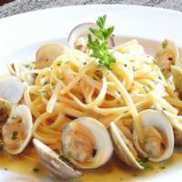 Linguini Vongole · Manila clams, yakima chardonnay, roasted garlic.
