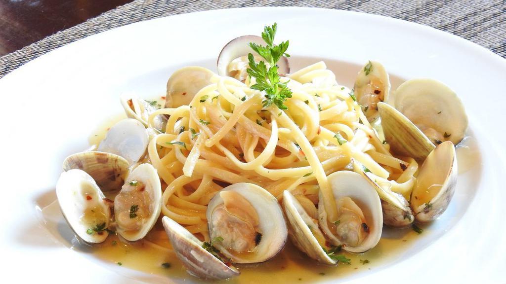 Linguini Vongole · Manila clams, yakima chardonnay, roasted garlic.
