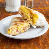 Big Egg & Cheese Breakfast Burrito · Two fluffy scrambled eggs, melty shredded Cheddar cheese, and skillet browned breakfast pota...