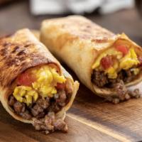 The Big Works Breakfast Burrito · Two fluffy scrambled eggs, melty shredded Cheddar cheese, sautéed red and green peppers, oni...