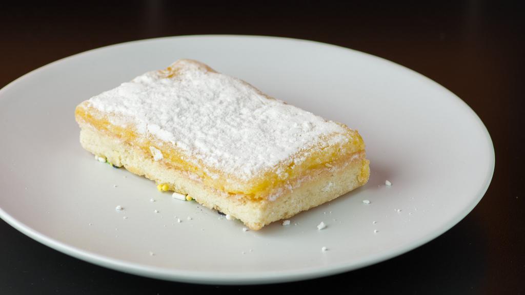 Lemon Bar · House-made shortbread crust topped with a tart lemon curd.