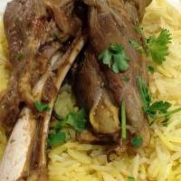 Lamb Shank · Stewed lamb with rice, salad and shank soup