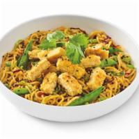 Impossible™ Orange Chicken Lo Mein · Lo mein noodles sautéed in orange sauce with. snap peas, napa and red cabbage, then topped w...
