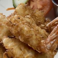 Coconut Shrimp (7) · Deep fried coconut shrimp. Served with sweet and sour sauce.