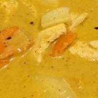 Yellow Curry · Yellow curry soup with potatoes, carrots, onions, coconut milk, and palm sugar. Choice of me...