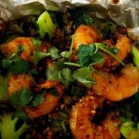 Garlic Shrimp · Shrimp sautéed in garlic and black pepper sauce served on top of steamed broccoli.