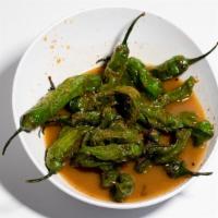 Shishito Pepper · Pan fried Japanese shishito peppers with butter, sake, and soy sauce with togarashi powder