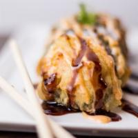 Las Vegas Roll · Deep fried roll salmon, avocado, crab mix, cream cheese with eel sauce and spicy aioli