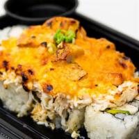 Volcano Roll (Baked Roll) · California roll, topped with mixture of baked fishes, crab mix, spicy aioli, eel sauce and s...