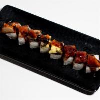 Fire Dragon Roll* · Spicy crab mix, shrimp tempura, and cucumber, topped with baked eel, avocado, eel sauce, and...