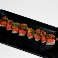 Garlic Spicy Tuna Roll* · Shrimp tempura, crab mix, and cucumber, topped with spicy tuna, roasted garlic, scallion, an...