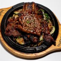 Marinated Galbi Grill · Korean style sweet soy sauce marinated short rib, and side rice
