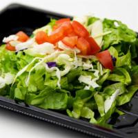 House Salad · Spring mix, iceberg, green cabbage, and tomato