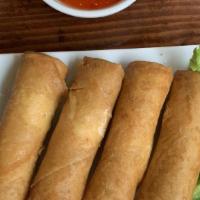 Crispy Spring Rolls · Vegan. Fried rolls with onions, taro root, carrots, cabbage, mung beans, and tofu. Includes ...