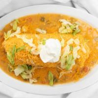 Chicken Smothered Burrito · Beans,Chicken,Rice  burrito smothered in green chile, cheese, lettuce and Sour cream