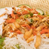 V2 - Curry Chicken · Chilled rice noodles with curry chicken on a bed of fresh romaine lettuce, bean sprouts, cri...