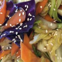 Stir-Fire Veggies · Green, purple cabbages, carrots and sesames