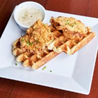 Fried Chicken & Waffles · Two buttermilk fried chicken breast on two Portland style waffles with the choice of our hou...