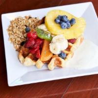 Fresh Fruit, Yogurt & Granola Waffle · Assorted Fresh Fruit, Vanilla Infused Yogurt, Homemade Maple Nut Granola