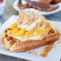 Pineapple Cheesecake Waffle · Fresh Pineapple, our special cheesecake pudding, graham cracker crumb topping, and whipped c...