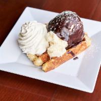 Hot Fudge Sundae Waffle · Vanilla ice cream, hot fudge, and whipped cream.