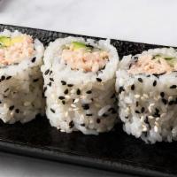 California Cut Roll · Seaweed paper with sushi rice on outside, filled with surimi crab, avocado and cucumber topp...