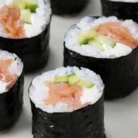 Philadelphia Cut Roll · Salmon, sushi rice, cream cheese and cucumber wrapped in seaweed.  Comes with fresh ginger, ...