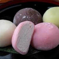 Vanilla Mochi Ice Cream · Premium vanilla ice cream in sweet rice dough with pop stick.