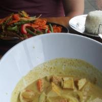 Yellow Curry · Choice of meat in yellow curry sauce, potatoes, carrots and onions. Spicy.